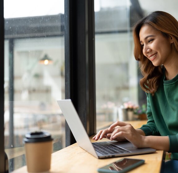 Asian woman working with laptop