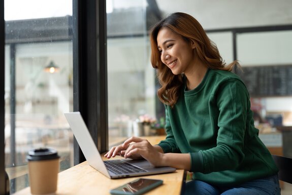 Asian woman working with laptop