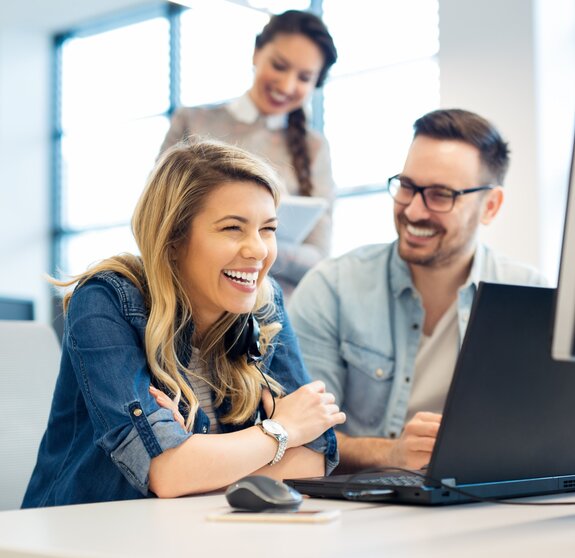 Group of business people and software developers working as a team in office